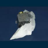 Fluorite (Jamesonite inclusions) with Chalcopyrite on Quartz
