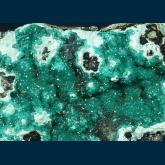 BG93-1 Dioptase on Chrysocolla from Ray Mine, Ray District, near Kearney, Dripping Springs Mts., Pinal County, Arizona, USA