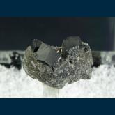 Bixbyite on Hematite (pseudo. Garnet)