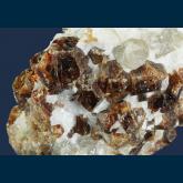 Grossular (var. Hessonite) in Quartz