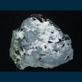 Neptunite and Joaquinites on Natrolite