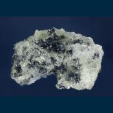Stibnite on Barite