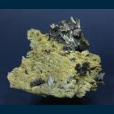 Stibnite on Quartz with Siderite