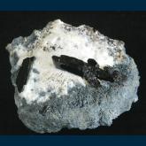 Neptunite on Natrolite