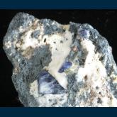 Benitoite with Joaquinite on Natrolite