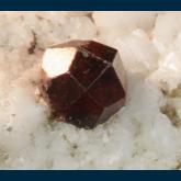 Spessartine garnet on Microcline