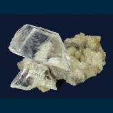 Gypsum (var. Selenite) with fluid inclusion on Quartz
