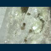 Zunyite on Quartz