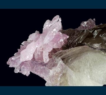 Q245 Quartz ( var. Rose ) on Quartz (var. Smoky) from Ilha claim, Taquaral, Jequitinhonha valley, Minas Gerais, Brazil Q245 Quartz ( var. Rose ) on Quartz (var. Smoky) from Ilha claim, Taquaral, Jequitinhonha valley, Minas Gerais, Brazil