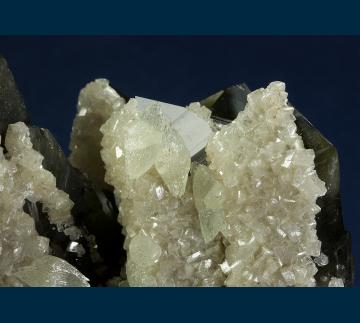 Q140 Quartz (var. Smoky) with Dolomite and Calcite from Cavnic, Maramures Co., Romania Q140 Quartz (var. Smoky) with Dolomite and Calcite from Cavnic, Maramures Co., Romania
