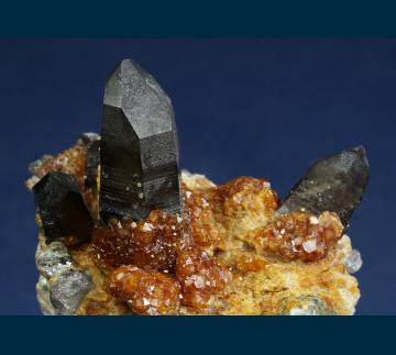 Q206 Spessartine garnet on Quartz (Smoky) with Orthoclase from Wushan Spessartine Mine, Tongbei, Yunxiao Co., Zhangzhou Prefecture, Fujian Province, China Q206 Spessartine garnet on Quartz (Smoky) with Orthoclase from Wushan Spessartine Mine, Tongbei, Yunxiao Co., Zhangzhou Prefecture, Fujian Province, China