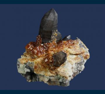 Q206 Spessartine garnet on Quartz (Smoky) with Orthoclase from Wushan Spessartine Mine, Tongbei, Yunxiao Co., Zhangzhou Prefecture, Fujian Province, China Q206 Spessartine garnet on Quartz (Smoky) with Orthoclase from Wushan Spessartine Mine, Tongbei, Yunxiao Co., Zhangzhou Prefecture, Fujian Province, China