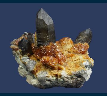 Q206 Spessartine garnet on Quartz (Smoky) with Orthoclase from Wushan Spessartine Mine, Tongbei, Yunxiao Co., Zhangzhou Prefecture, Fujian Province, China Q206 Spessartine garnet on Quartz (Smoky) with Orthoclase from Wushan Spessartine Mine, Tongbei, Yunxiao Co., Zhangzhou Prefecture, Fujian Province, China