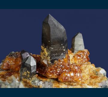 Q206 Spessartine garnet on Quartz (Smoky) with Orthoclase from Wushan Spessartine Mine, Tongbei, Yunxiao Co., Zhangzhou Prefecture, Fujian Province, China Q206 Spessartine garnet on Quartz (Smoky) with Orthoclase from Wushan Spessartine Mine, Tongbei, Yunxiao Co., Zhangzhou Prefecture, Fujian Province, China