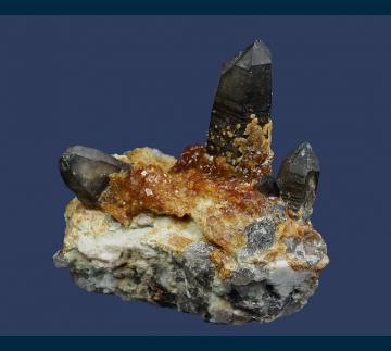 Q206 Spessartine garnet on Quartz (Smoky) with Orthoclase from Wushan Spessartine Mine, Tongbei, Yunxiao Co., Zhangzhou Prefecture, Fujian Province, China Q206 Spessartine garnet on Quartz (Smoky) with Orthoclase from Wushan Spessartine Mine, Tongbei, Yunxiao Co., Zhangzhou Prefecture, Fujian Province, China