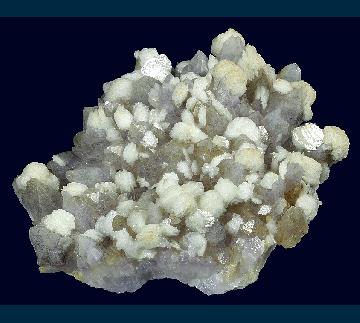 ELC0529 Calcite on Amethystine Quartz from Guanajuato, Guanajuato Municipality, Guanajuato, Mexico ELC0529 Calcite on Amethystine Quartz from Guanajuato, Guanajuato Municipality, Guanajuato, Mexico