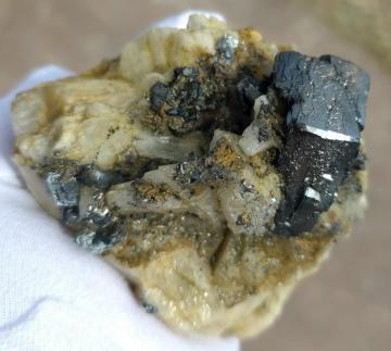 DEB2453 Hematite ( var. Eisenrose ) on Adularia with Rutile and Quartz from La Fibbia, St. Gotthard, Ticino Canton, Switzerland