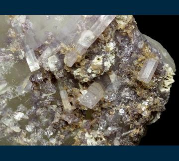 ST104 Elbaite with Lepidolite on Quartz from Stewart Mine, Pala District, San Diego County, California, USA ST104 Elbaite with Lepidolite on Quartz from Stewart Mine, Pala District, San Diego County, California, USA
